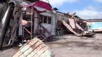 Пожар в ТЦ "Планета" г. Заозерного тушили с помощью пожарного поезда из Уяра