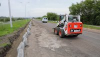 У КПП в сторону города появится новый асфальт